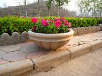 Our Stone Composite Roman Style Planter Site Amenities are perfectly complimented with plants and flowers
