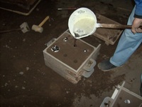Pouring Metal into the Sand Cast Mold for Mailbox Top Cover Ball Accessory