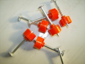 Multiple injection parts manufactured by injection molding with caulking and a electrogalvanized nail